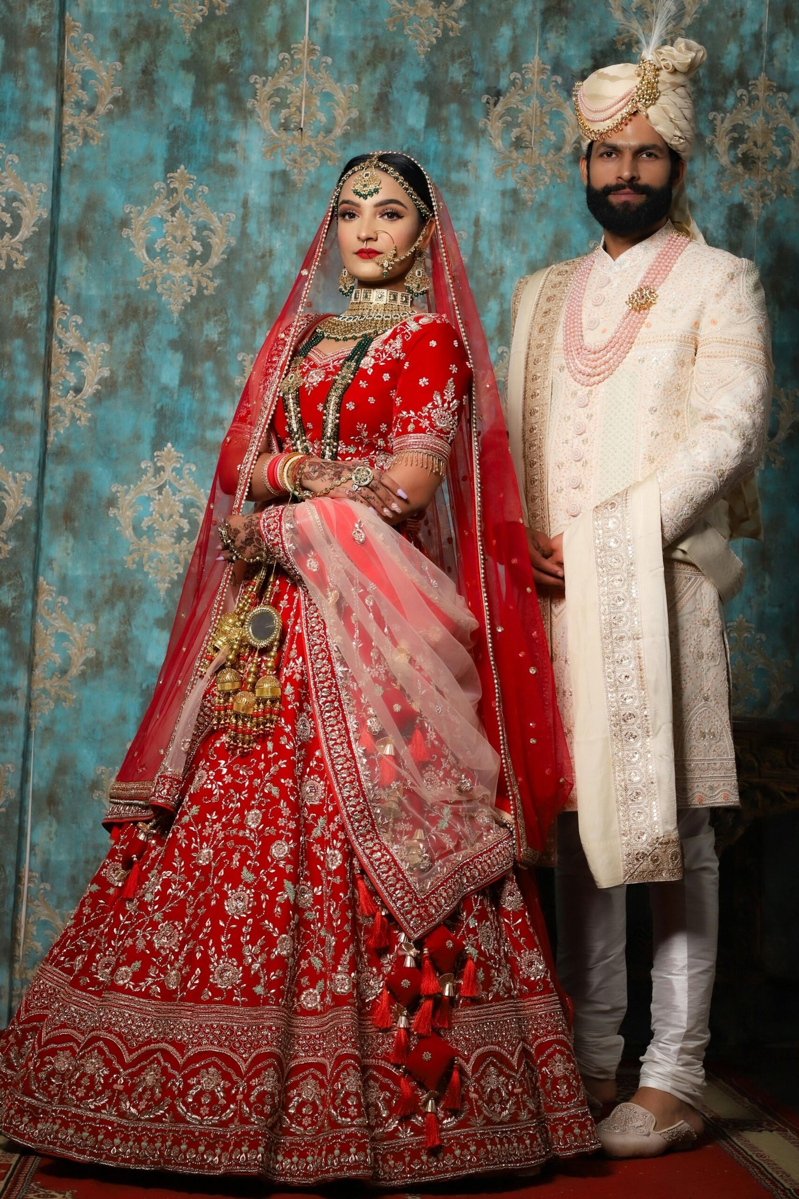 A stunning portrait of an Indian couple in traditional wedding attire, showcasing cultural elegance and beauty.